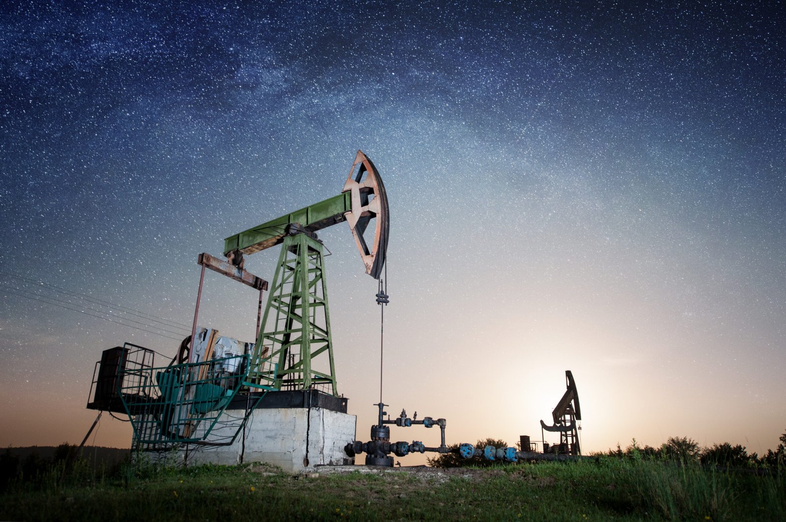 Oil pump on the oil field in the night